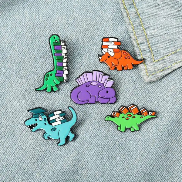 Dinobooks Enamel Pins Set